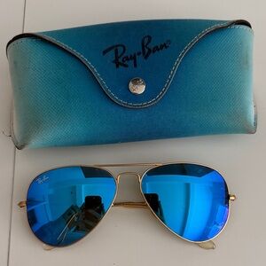 Ray-Ban Gold Frame Sunglasses with Vibrant Blue Lenses